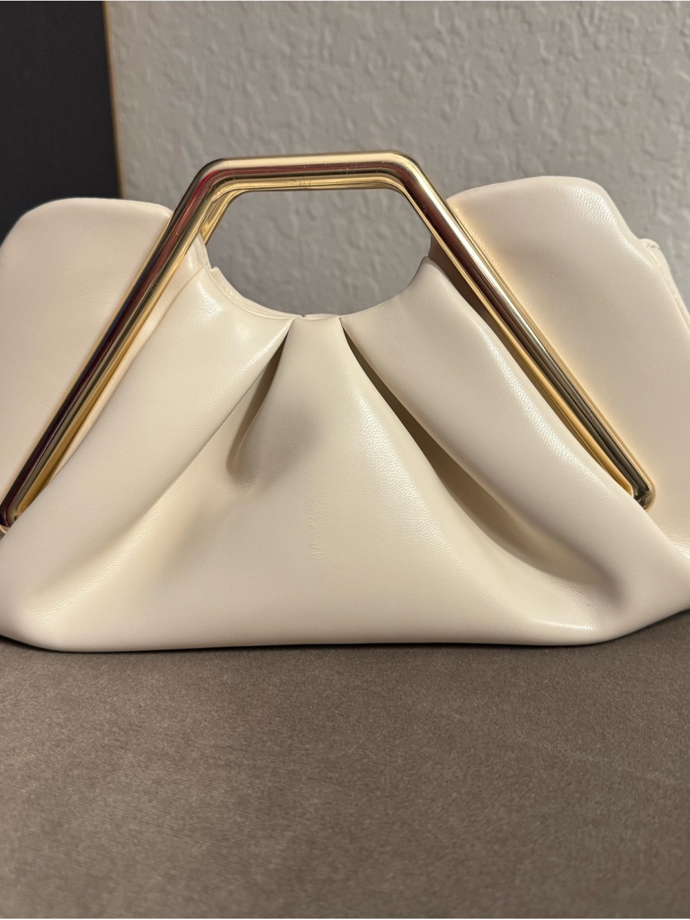 JW PEI Cream Clutch with Gold Frame Handle